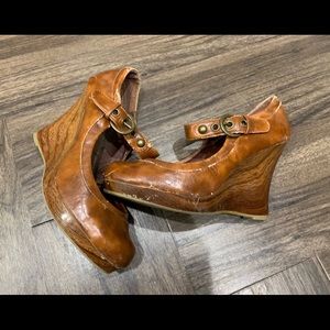 shiny light brown heeled shoes